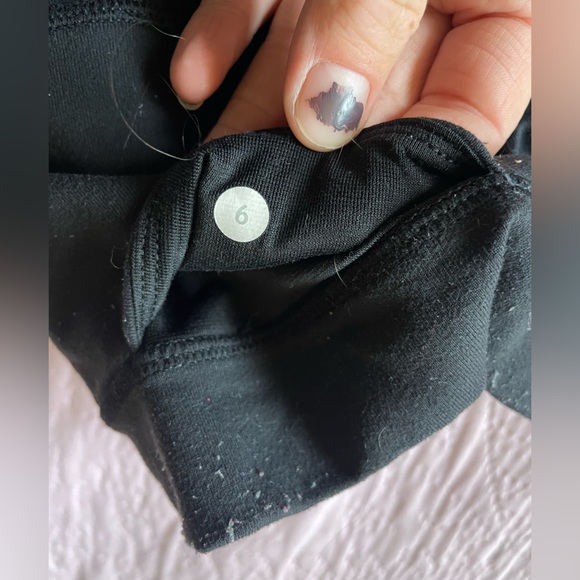 Black Lululemon leggings with criss-cross on the back of the legs - Picture 3 of 3